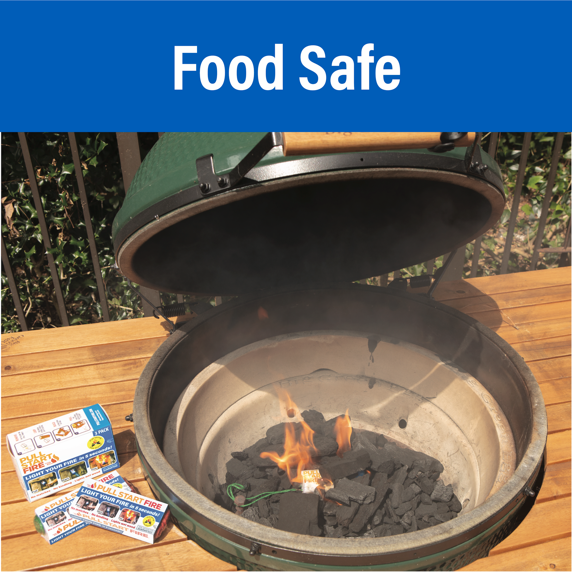 An open grill with charcoal and lit fire starter below text that says, "Food Safe."